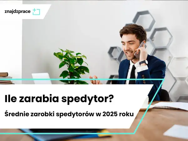 Uśmiechnięty mężczyzna w garniturze rozmawia przez telefon w nowoczesnym biurze.